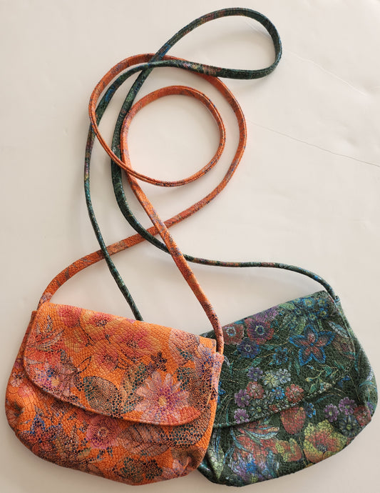 floral leather patterned crossbody for phone and small items. choice of Orange or Hunter backround