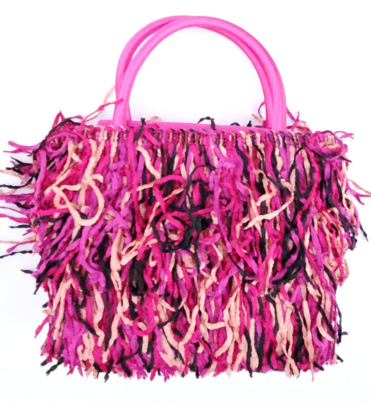 hot pink satin evening bag with layers of soft and colorful cheninille in mixed pinks and pieces of black mixed in